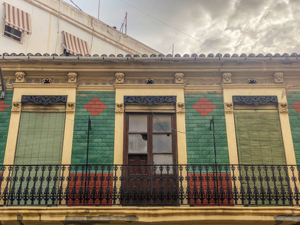 Low angle view of traditional old house in the city of Valencia, Spain, which has been abandoned