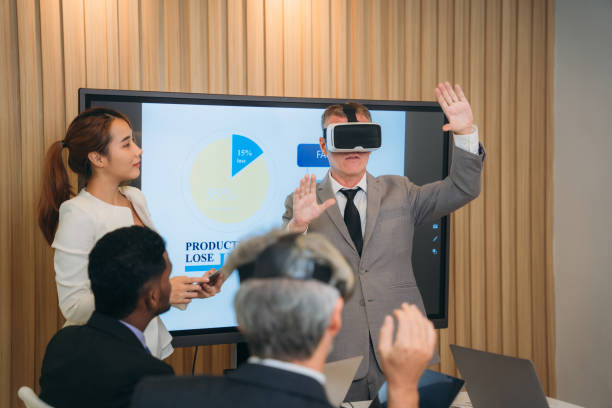 istock During the workplace meeting, the business team used a virtual reality headset. 1436651847