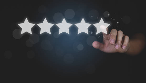 istock Customer review good rating concept and hand pressing smile face icon and five star on visual screen for quality and positive customer feedback, testimonial and testimony. 1436655740