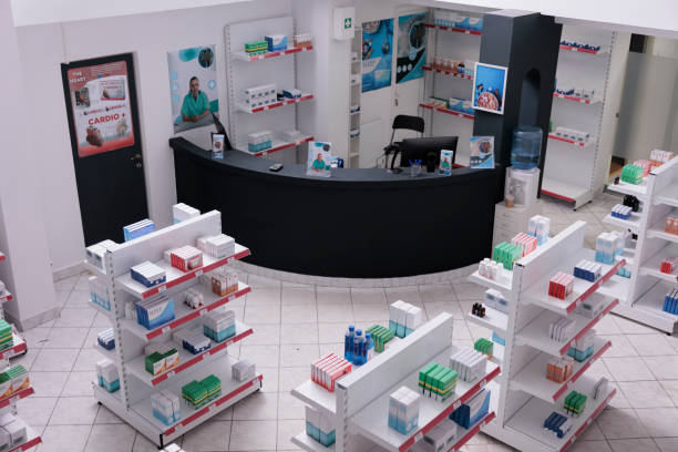 istock Empty pharmacy with nobody in it having shevles with pharmaceutical products 1436657437