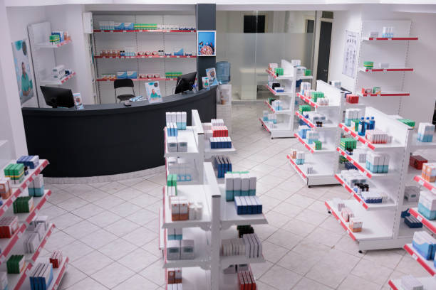 istock Empty pharmacy with nobody in it having shelves full with pharmaceutical product 1436657456