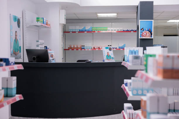 istock Empty pharmacy shelves full with pharmaceutical products 1436657476