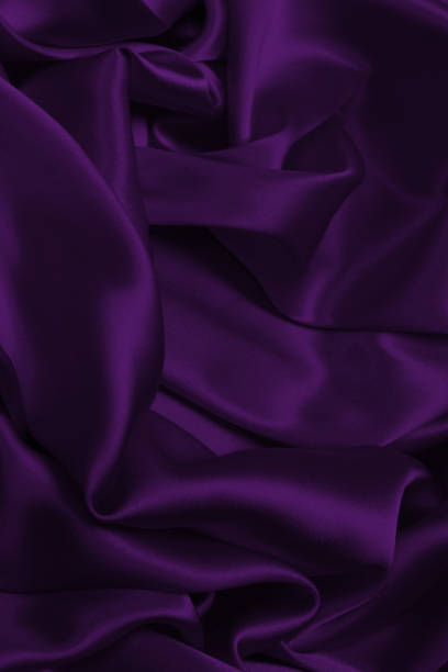 istock Rich and luxury red silk fabric texture background. 1436659594