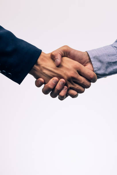 istock Male handshake in the office company 1436659710