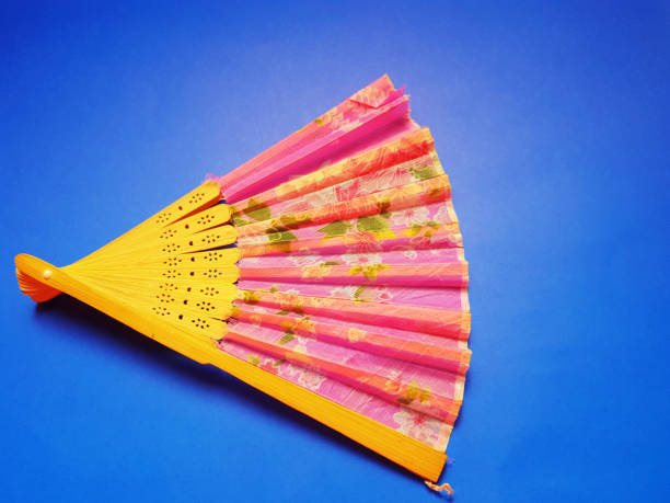istock Handmade old hand-crafted fan that is starting to break down 1436661508