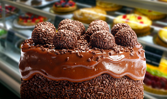 Chocolate cake with bonbon with chocolate sprinkles