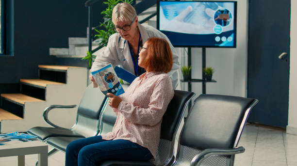 istock Elderly medic and patient talking about medical service 1436663210