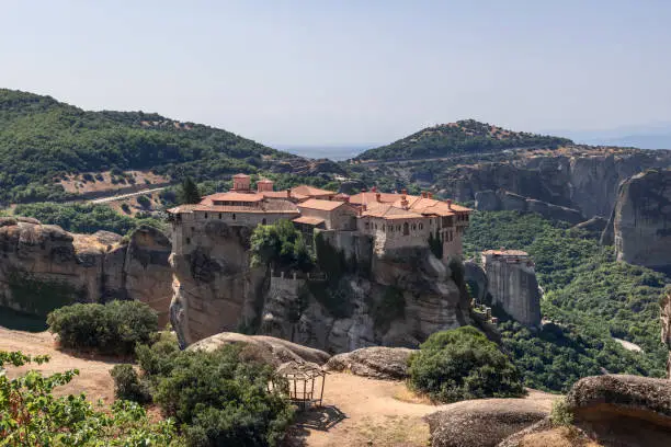 Photo of Varlaam monastery in the foreground to the Rousanou Monastery in the background below,  Kalabaka municipality, Trikala, Thessaly, Greece.