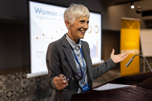istock Successful businesswoman having a speech during business conference 1436667807