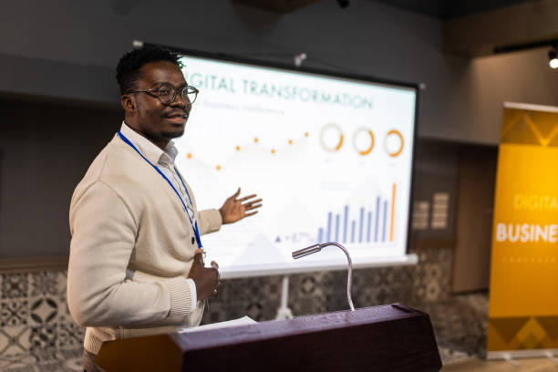 Businessman having a speech during business seminar at convention center
