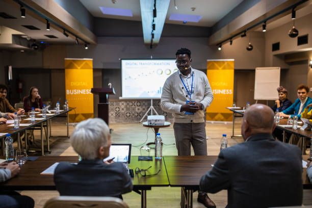istock Businessman having a speech during business seminar at convention center 1436668201