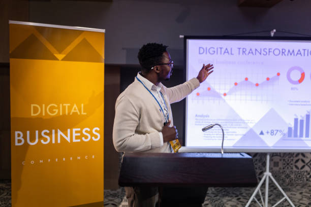 istock Businessman having a speech during business seminar at convention center 1436669012