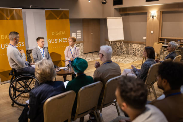 istock Business people participates in panel discussion at conference center 1436669704