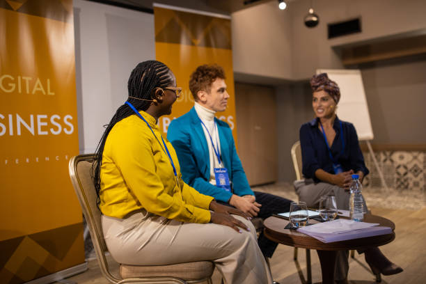 istock Business people participates in panel discussion at conference center 1436669896