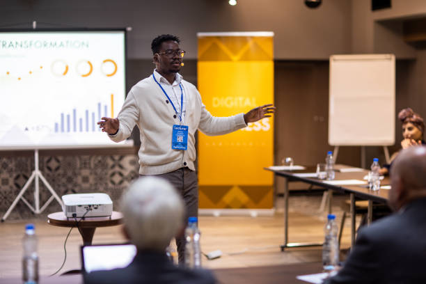 istock Businessman having a speech during business seminar at convention center 1436671066