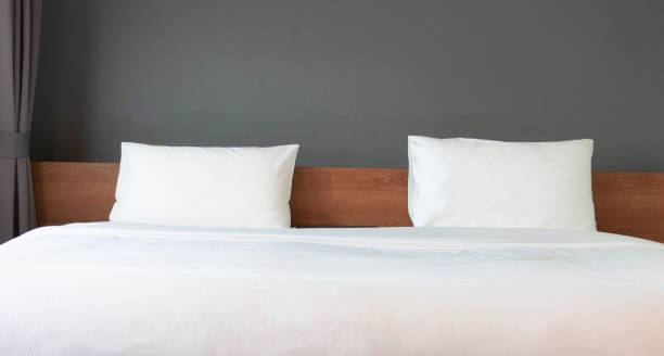 istock white pillows and blanket in bedroon 1436671630