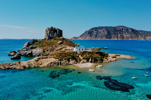 A natural view of the Kos Island and Kefalos Beach in Greece  under a clear sunny sky