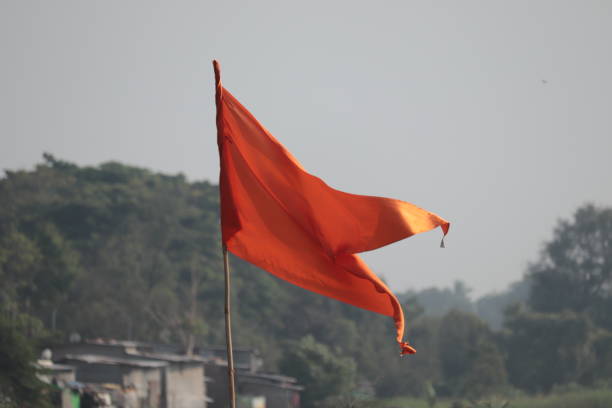 orange flag with blurred background - maratha imagens e fotografias de stock