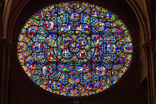 Sens (Yonne, Burgundy, France) - Interior of the Saint-Etienne cathedral, in gothic style, stained glass and part of rose window (ancient artwork, public domain)