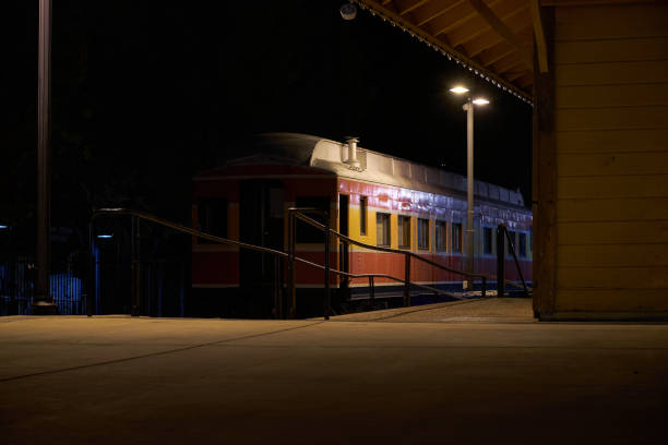 Downtown Folsom, CA, Sutter Street with a train at night The downtown Folsom, CA, Sutter Street with a train at night old folsom stock pictures, royalty-free photos & images