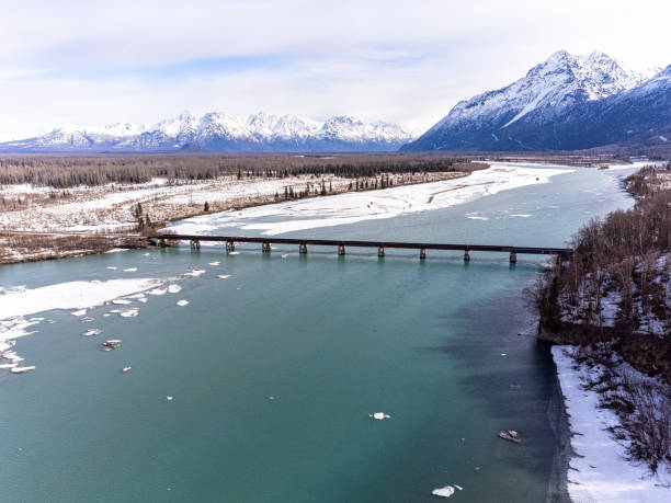 Aerial of Spring Breakup on the Knick River, between Anchorage and Wasilla, Alaska.  Glenn Hwy Bridge.