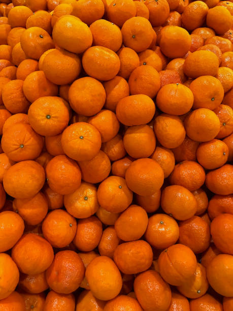istock Oranges. Heap of oranges. Oranges background. 1436675135