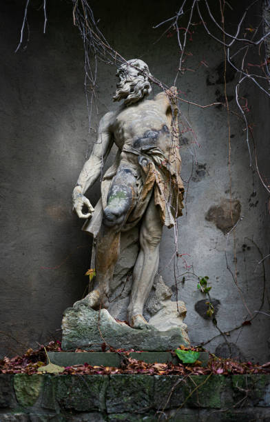 istock Vertical closeup of the beautiful old stone statue with a broken arm. 1436675154