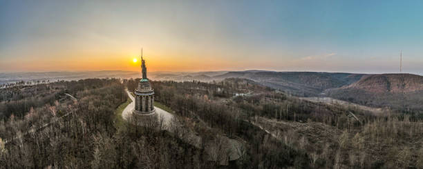 Panoramic view of the Hermannsdenkmal monument on a hill at the sunset in Detmold, Germany A panoramic view of the Hermannsdenkmal monument on a hill at the sunset in Detmold, Germany detmold stock pictures, royalty-free photos & images