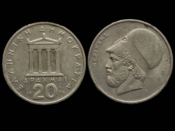 istock Both sides of vintage Greek drachma coins. 1436675523