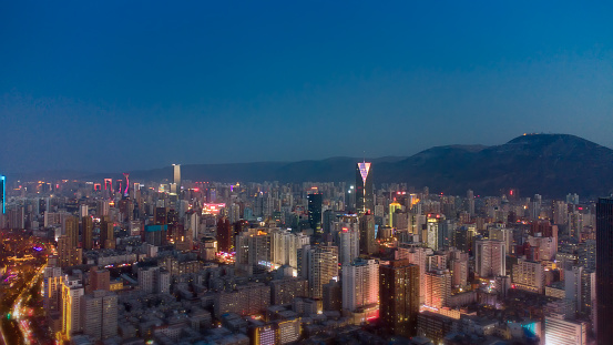 An aerial view of a night sky over the skyline of Lanzhou, China