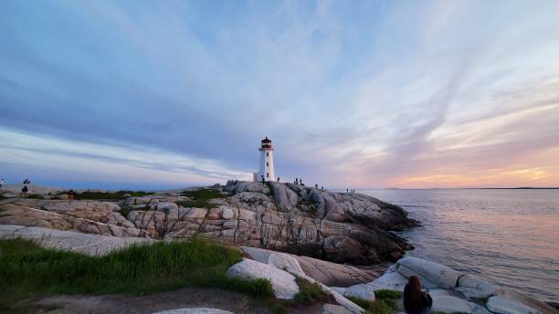 istock View of Peggys Point Lighthouse at sunset.  Nova Scotia, Canada. 1436676724