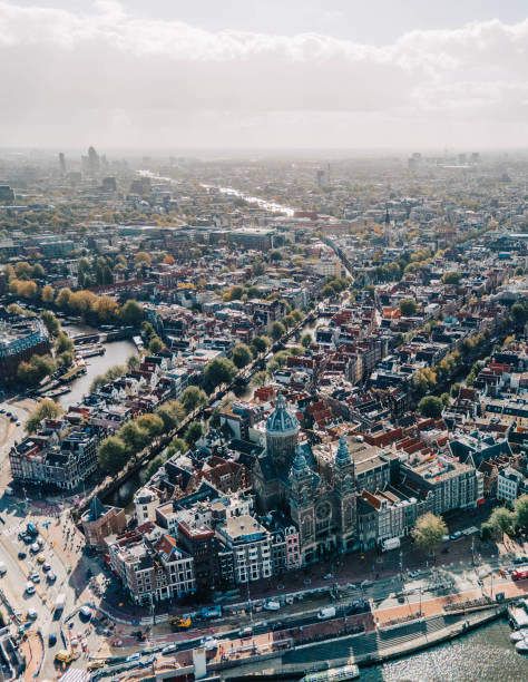 istock Vertical aerial shot of downtown Amsterdam under the bright sunlight 1436677132