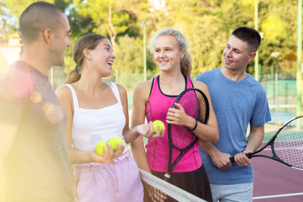 istock Group photo of positive people talking 1436677622