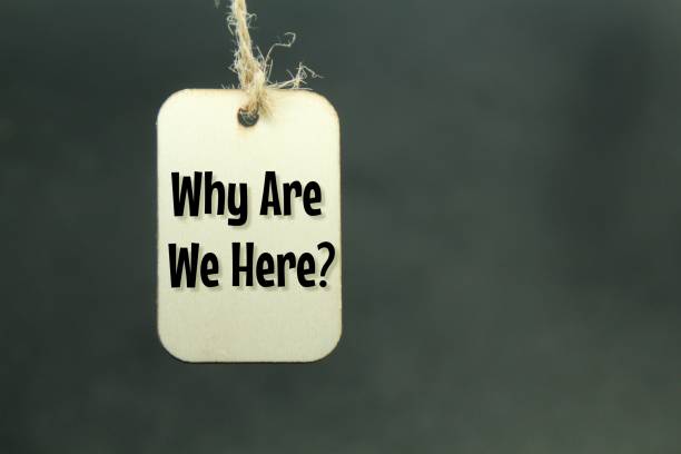 wooden tags with the word or question Why Are We Here