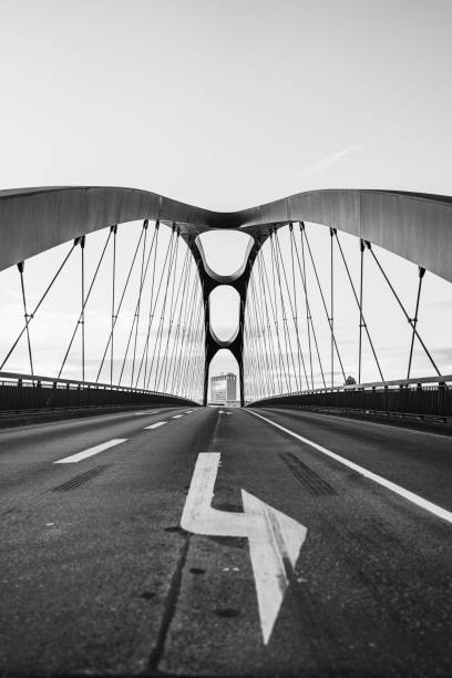 istock Vertical shot of arched Honsell bridge - Frankfurt am Main, Germany 1436678995