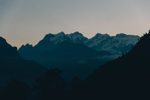 istock Scenic view to mountains in evening 1436679572