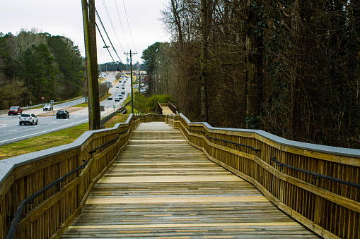 A walking wooden trail bridge in the center of Suwanee, Georgia, United States