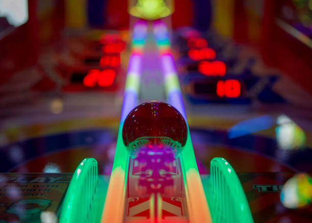 Low angle shot of a colorful arcade pinball game machine in Brighton A low angle shot of a colorful arcade pinball game machine in Brighton pinball machine stock pictures, royalty-free photos & images