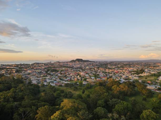 Aerial view of the cityscape of San Fernando against the dusk sky at sunset in Trinidad and Tobago An aerial view of the cityscape of San Fernando against the dusk sky at sunset in Trinidad and Tobago tobago stock pictures, royalty-free photos & images