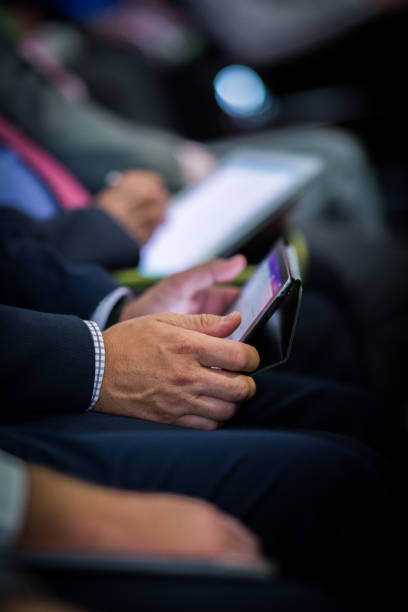 istock Selective focus shot of a man using tablet during the conference. 1436681381