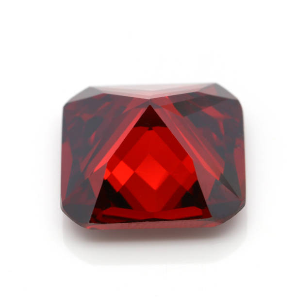 istock Closeup of a red ruby gemstone isolated on a white backgrou 1436681942