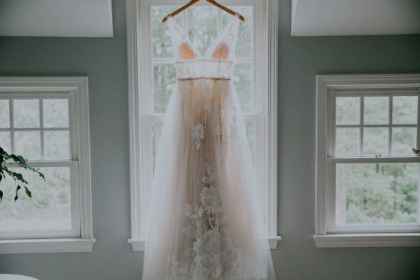 istock Beautiful wedding dress in windows wide 1436683278