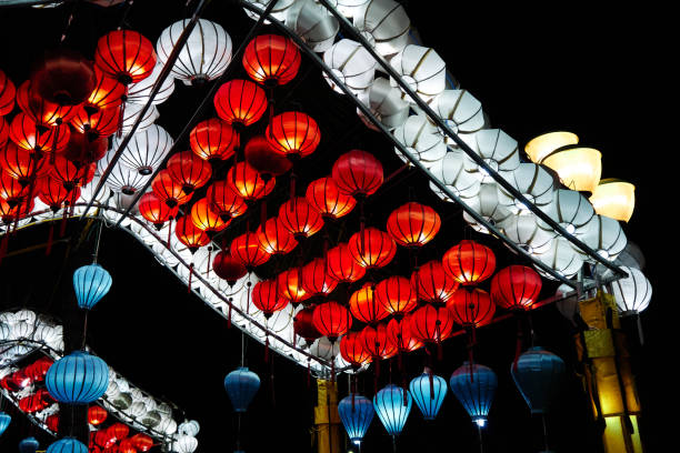 istock Colorful lighted Chinese paper lanterns hanging from the ceiling 1436684025
