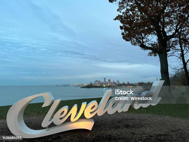 Closeup Shot Of The Cleveland Sign With Cityscape In The Background Stock Photo - Download Image Now