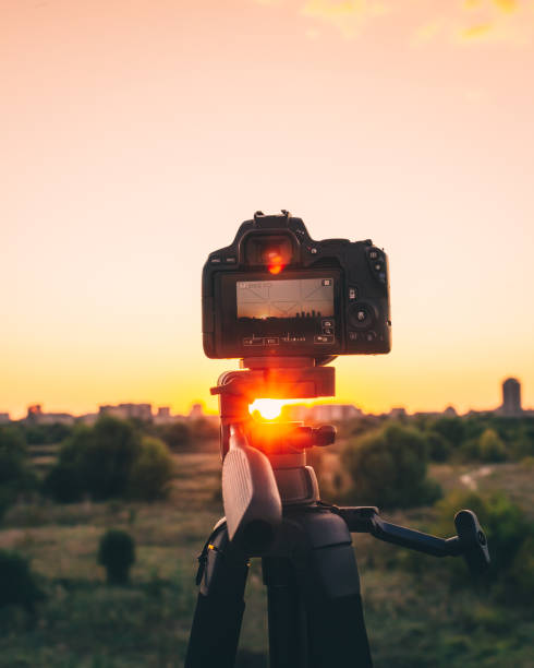 istock Closeup of a camera at sunset 1436684880