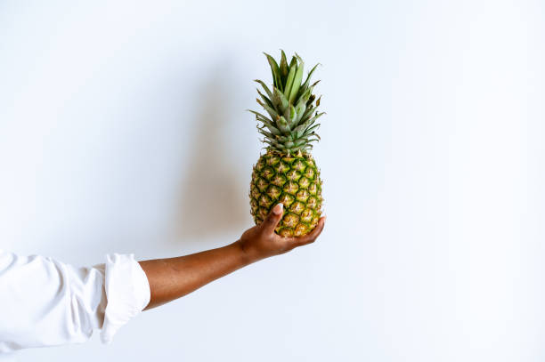 Woman Holding Pineapple