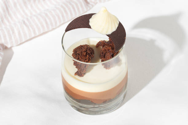 Three chocolate mousse dessert in a glass