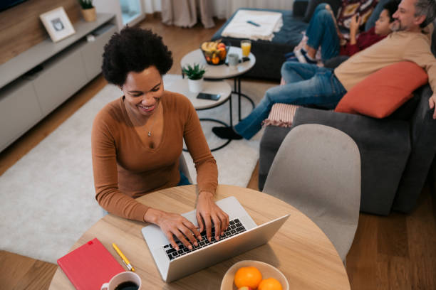 istock Businesswoman working from home using a laptop 1436689935