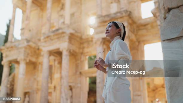 Portrait Of Female Young Tourist In Historical Ancient Old Town Stock Photo - Download Image Now