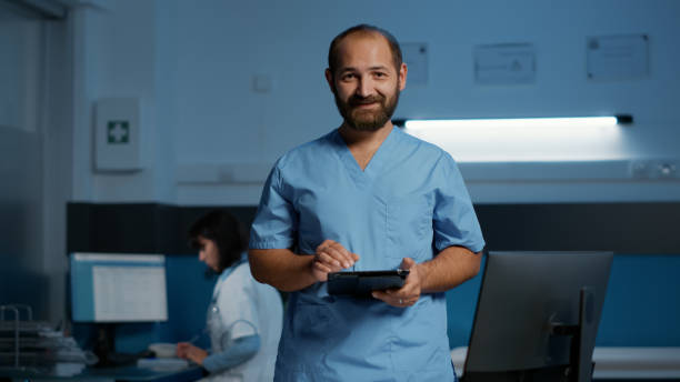 istock Physician nurse holding tablet computer checking patient diagnosis while typing medical expertise 1436694092